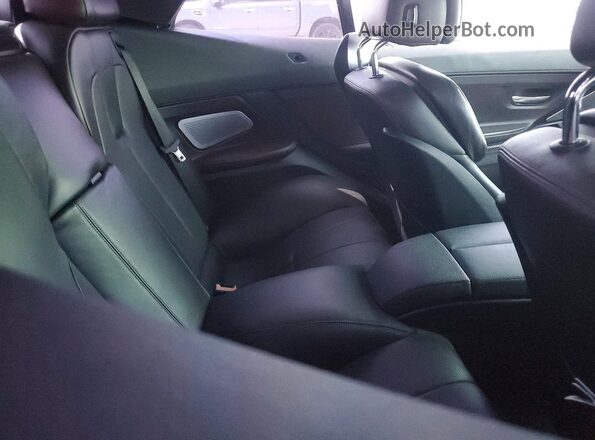 WBS6G9C57GD931995 2016 BMW M6 White Vista de los asientos traseros