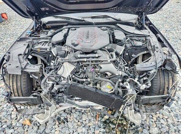 WBS83FK0XSCU38299 2025 BMW M5 Black Вид задньої частини салону