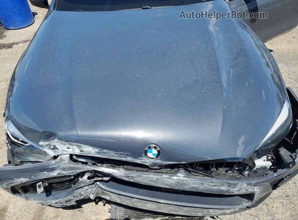WBSGV0C03LCD68215 2020 BMW M8 Gray Widok wnętrza z tyłu