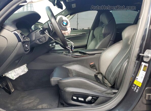WBSJF0C03LCD30910 2020 BMW M5 Угольный Вид салона спереди