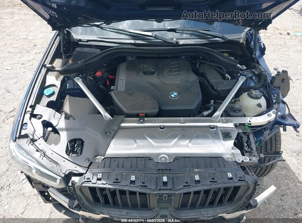 WBX57DP07RN262969 2024 BMW X3 Blue Rear view