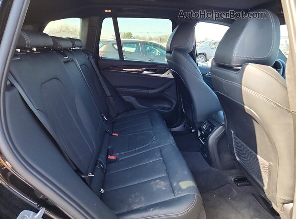 WBX57DP0XRN310755 2024 BMW X3 Black Սալոնի հետևի տեսք