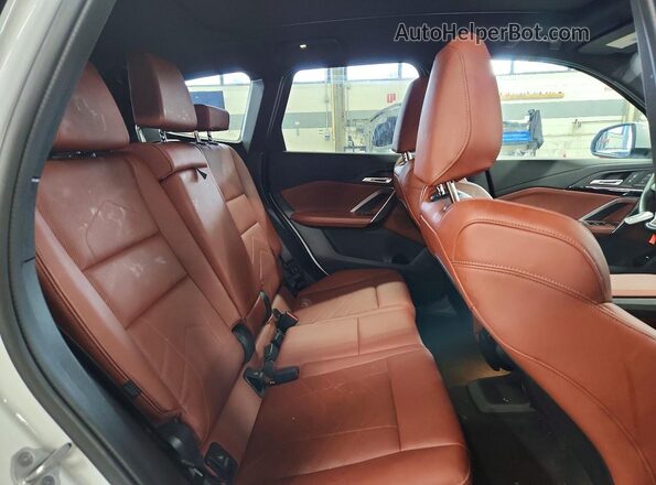 WBX73EF04T5470908 2026 BMW X1 White Rear seats view