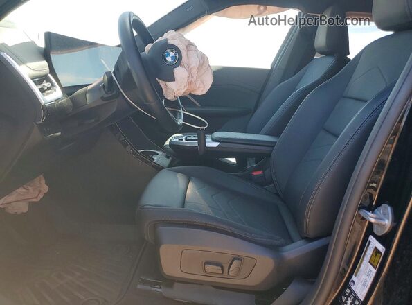 WBX73EF07S5220643 2025 BMW X1 Black Front interior view