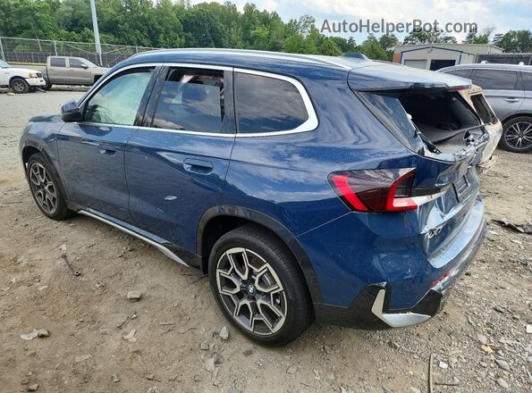 WBX73EF07T5588273 2026 BMW X1 Blue Trasero izquierdo