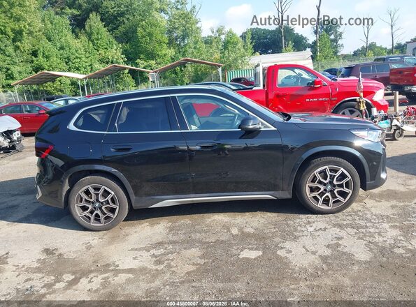 WBX73EF09T5421008 2026 BMW X1 Black Rear interior view