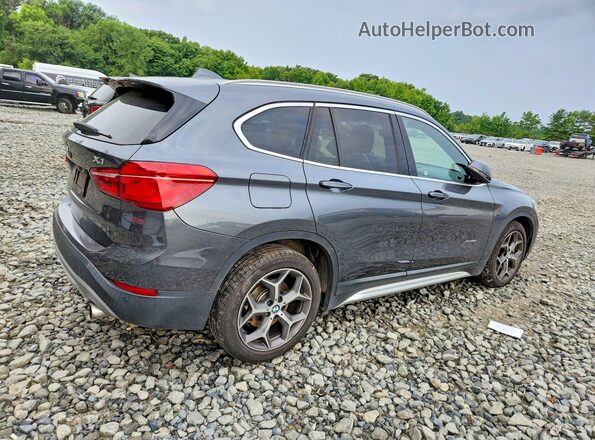 WBXHT3C30G5E50798 2016 BMW X1 Gray Rear right