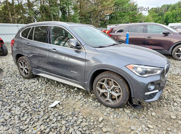 WBXHT3C30G5E50798 2016 BMW X1 Gray Front right