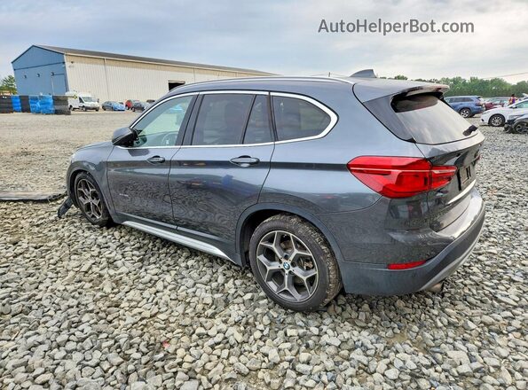 WBXHT3C30G5E50798 2016 BMW X1 Gray Rear left