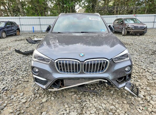WBXHT3C30G5E50798 2016 BMW X1 Gray Front view