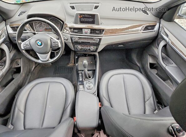 WBXHT3C30G5E50798 2016 BMW X1 Gray Dashboard view