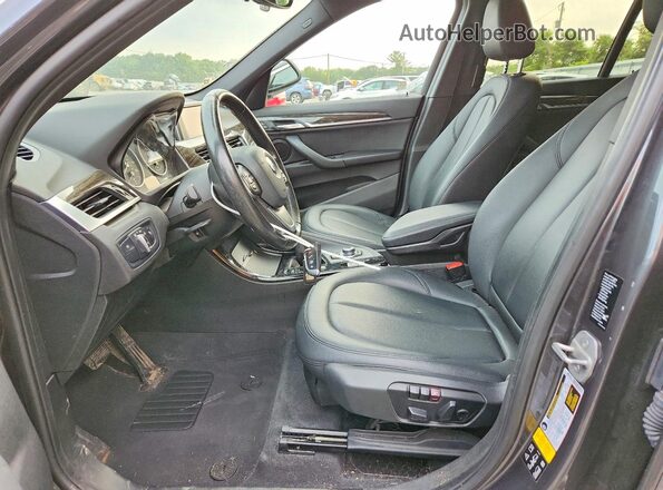 WBXHT3C30G5E50798 2016 BMW X1 Gray Front interior view