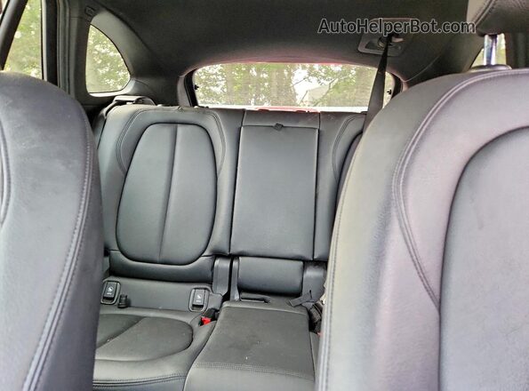 WBXHT3C30G5E50798 2016 BMW X1 Gray Rear seats view