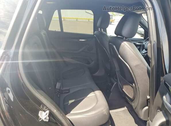 WBXHT3C30J5L24459 2018 BMW X1 Black უკანა სავარძლების ხედი