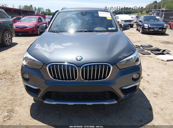 WBXHT3C30J5L28320 2018 BMW X1 Gray ხელსაწყოთა პანელის ხედი