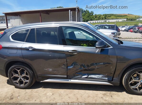 WBXHT3C30J5L28320 2018 BMW X1 Gray უკანა სალონის ხედი