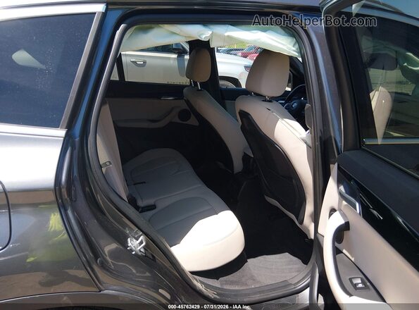 WBXHT3C30J5L28320 2018 BMW X1 Gray VIN კოდის სტიკერის ხედი
