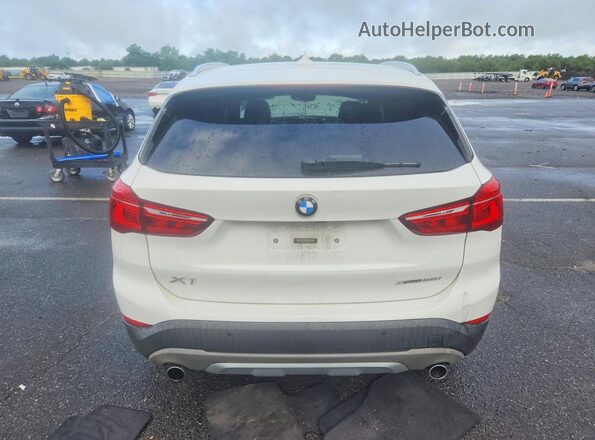 WBXHT3C30J5L30326 2018 BMW X1 White Հետևի տեսք