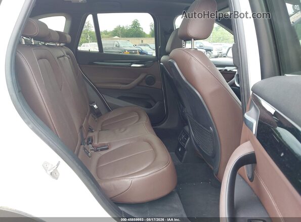 WBXHT3C30J5L32805 2018 BMW X1 White VIN sticker view