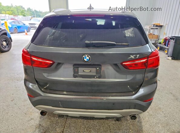 WBXHT3C31G5E47182 2016 BMW X1 Gray უკანა ხედი