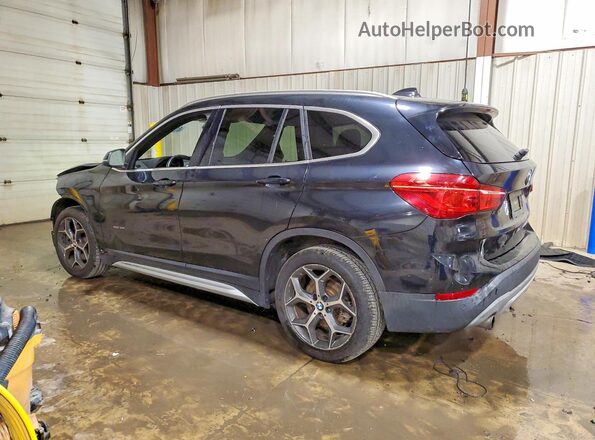 WBXHT3C31GP883886 2016 BMW X1 Black Rear left