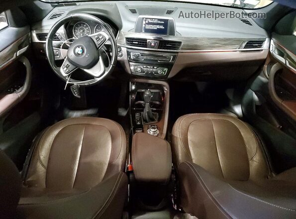 WBXHT3C31GP883886 2016 BMW X1 Black Dashboard view
