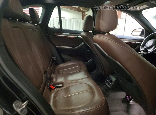 WBXHT3C31GP883886 2016 BMW X1 Black Rear interior view