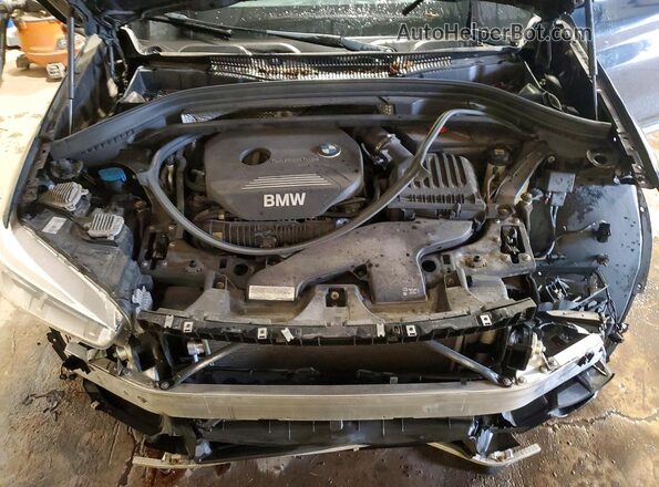 WBXHT3C31GP883886 2016 BMW X1 Black Engine compartment view