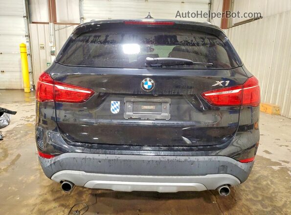 WBXHT3C31GP883886 2016 BMW X1 Black Rear view