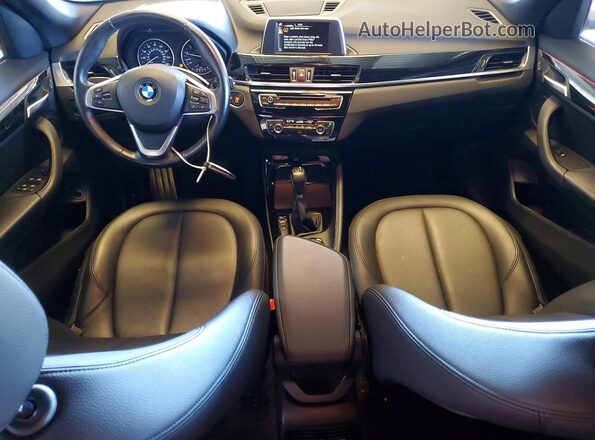 WBXHT3C31GP884035 2016 BMW X1 Black Առջևի վահանակի տեսք