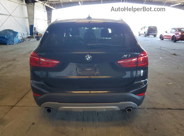 WBXHT3C31GP884035 2016 BMW X1 Black Հետևի տեսք