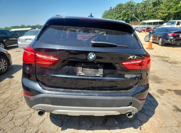 WBXHT3C31H5F74886 2017 BMW X1 Black უკანა ხედი