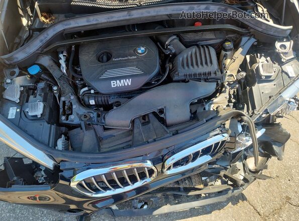 WBXHT3C31H5F74886 2017 BMW X1 Black უკანა სალონის ხედი