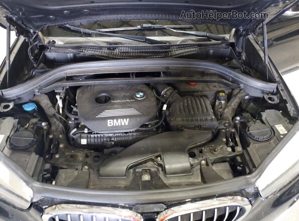 WBXHT3C31H5F77402 2017 BMW X1 Black Սալոնի հետևի տեսք