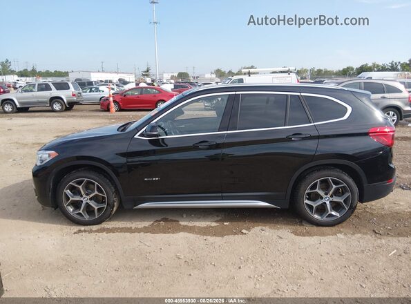 WBXHT3C31H5F82308 2017 BMW X1 Black Սալոնի 360 աստիճան տեսք