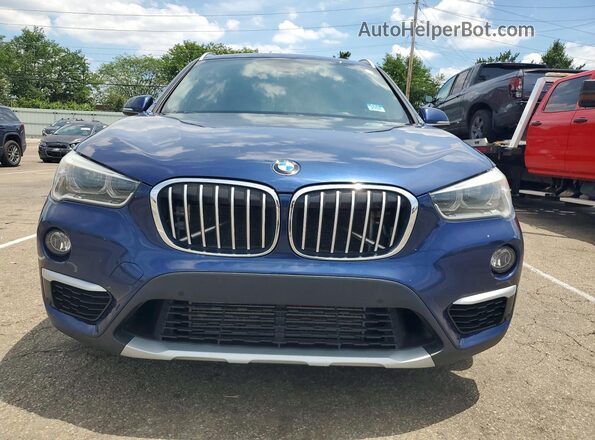 WBXHT3C31H5F86620 2017 BMW X1 Blue Դիմացի տեսք