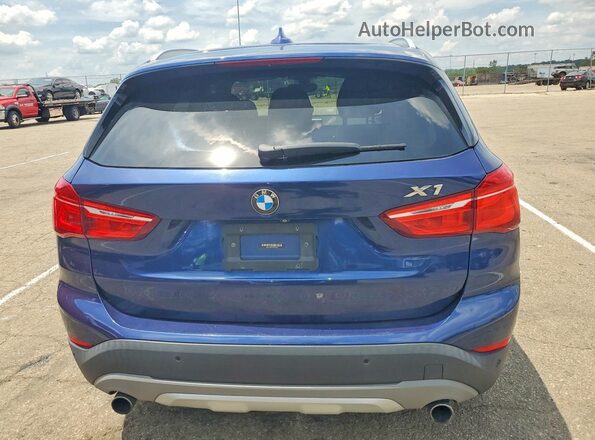 WBXHT3C31H5F86620 2017 BMW X1 Blue Հետևի տեսք