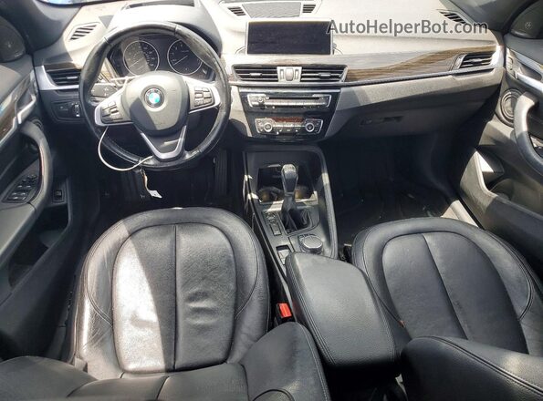 WBXHT3C31H5F86620 2017 BMW X1 Blue Առջևի վահանակի տեսք