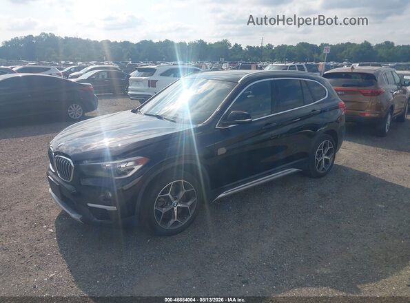 WBXHT3C31J5L29959 2018 BMW X1 Black წინა მარცხენა ხედი სამი მეოთხედიდან