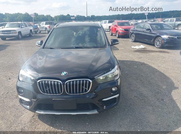 WBXHT3C31J5L29959 2018 BMW X1 Black ხელსაწყოთა პანელის ხედი