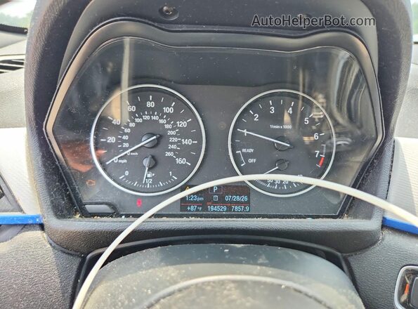 WBXHT3C32G5E49233 2016 BMW X1 Gray ხელსაწყოთა პანელის ხედი