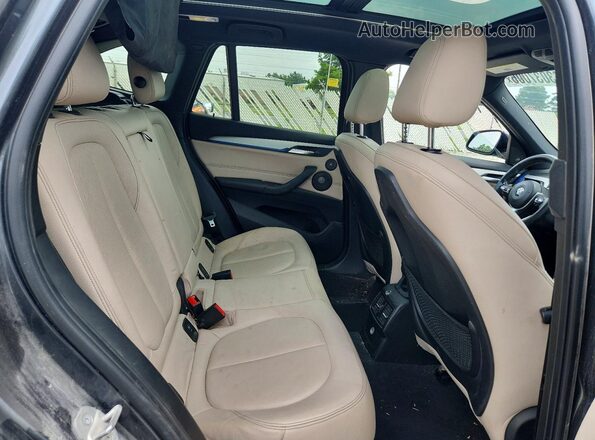 WBXHT3C32G5E49233 2016 BMW X1 Gray უკანა სალონის ხედი