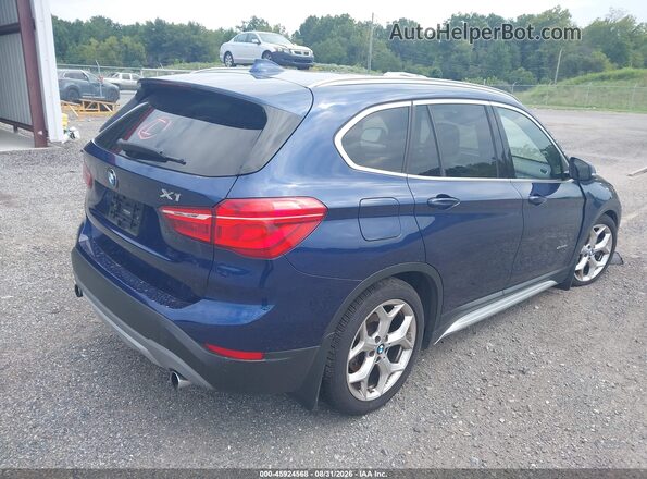 WBXHT3C32G5F65788 2016 BMW X1 Blue Rear right