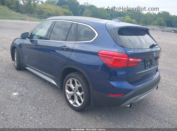 WBXHT3C32G5F65788 2016 BMW X1 Blue Rear left