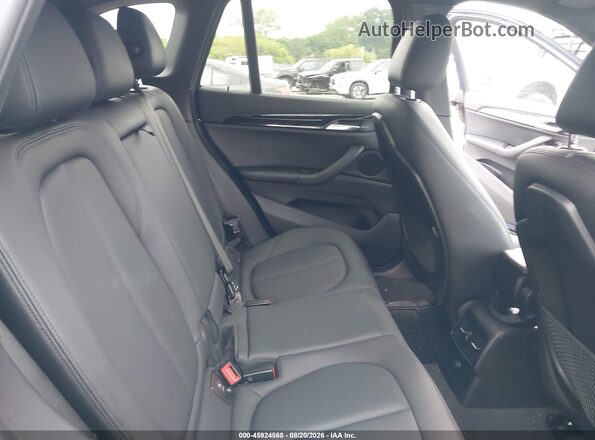 WBXHT3C32G5F65788 2016 BMW X1 Blue VIN sticker view
