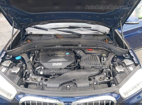 WBXHT3C32G5F65788 2016 BMW X1 Blue Rear view