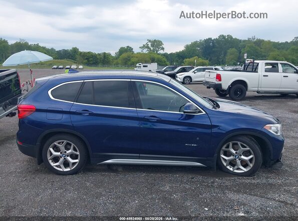 WBXHT3C32G5F65788 2016 BMW X1 Blue Instrument cluster view