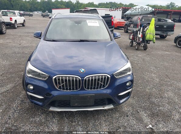 WBXHT3C32G5F65788 2016 BMW X1 Blue Dashboard view