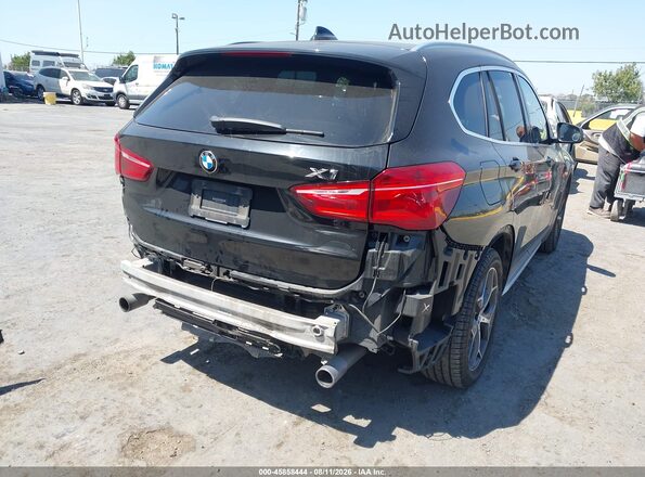 WBXHT3C32H5F68031 2017 BMW X1 Black Trasero derecho