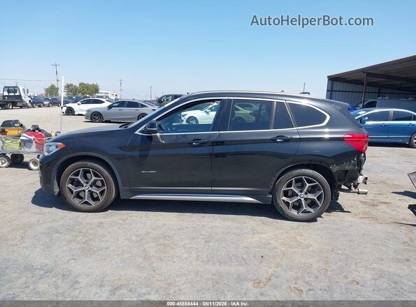 WBXHT3C32H5F68031 2017 BMW X1 Black 